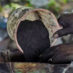 Produksi briket batok kelapa